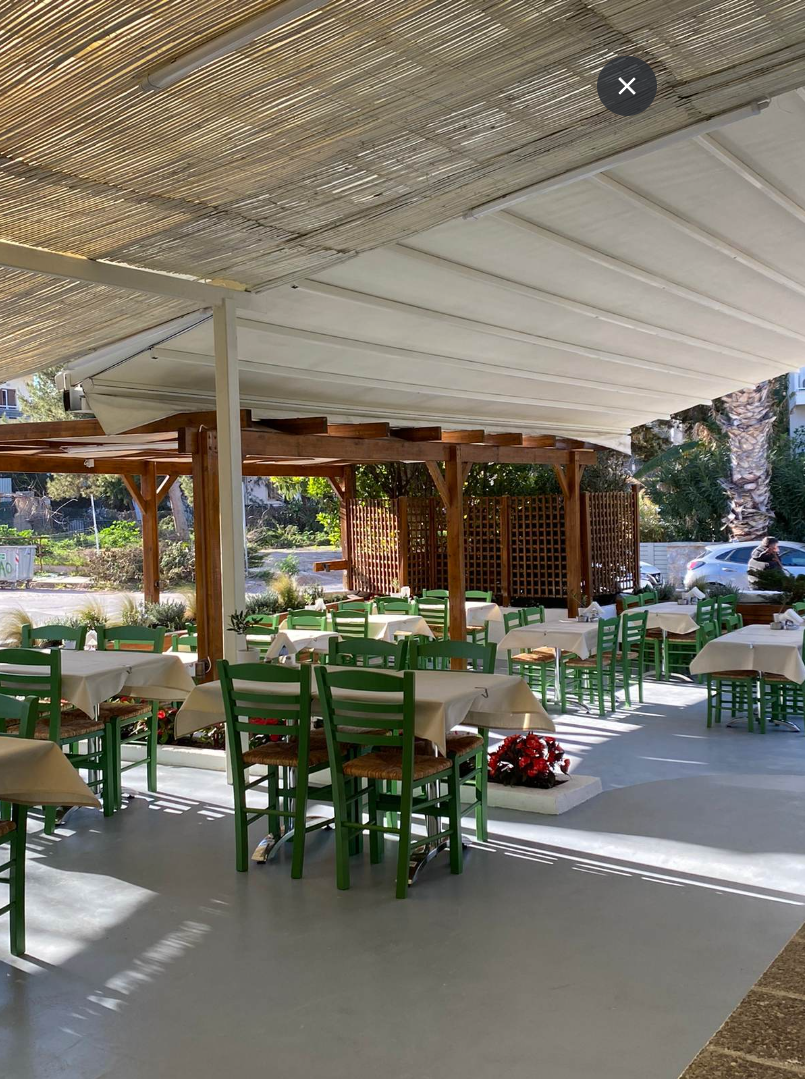 Armellada Taverna — Greek seafood restaurant interior in Nea Makri, Greece
